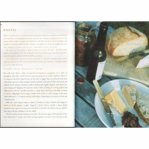 Hardcover copy of The River Cottage Year by Hugh Fearnley-Whittingstall, non-fiction book about seasonal cooking and rural life.