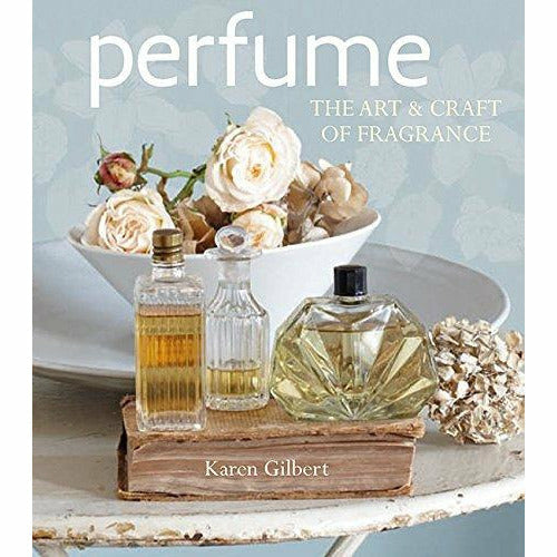 Hardcover book titled "Perfume: The Art and Craft of Fragrance" by Karen Gilbert, featuring a cover with perfume bottles and floral design.