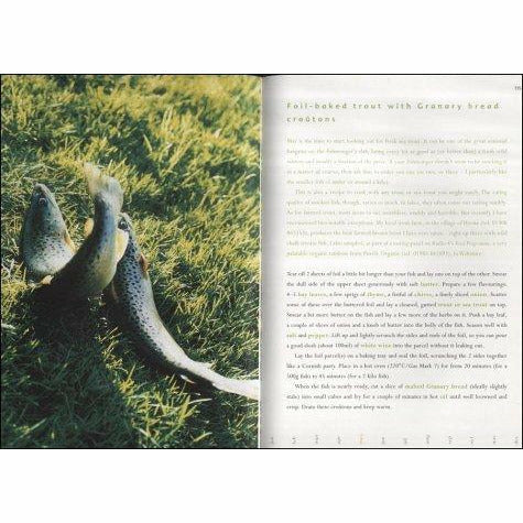 Hardcover copy of The River Cottage Year by Hugh Fearnley-Whittingstall, a non-fiction book about seasonal cooking and sustainable living.