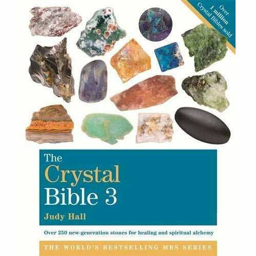 Open pages of The Crystal Bible 3 Books Collection set by Judy Hall, non-fiction paperback on crystals and healing.