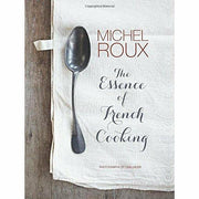 Hardcover copy of "The Essence of French Cooking" by Michel Roux, featuring French culinary recipes and techniques.