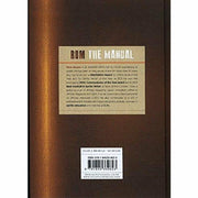 Hardcover of "Rum The Manual" by Dave Brown, featuring a book cover with rum bottles and a tropical background.
