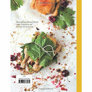 Hardcover cookbook titled "A Bird In The Hand" by Diana Henry featuring chicken recipes for everyday meals, published by Mitchell Beazley.