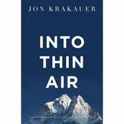 Paperback of Into Thin Air by Jon Krakauer, featuring the book cover with mountain imagery and title text.