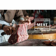 Hardcover copy of "Meat: The Ultimate Companion" by Anthony Puharich, featuring a close-up of the book cover with meat-themed imagery.