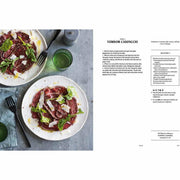 Hardcover copy of "Meat: The Ultimate Companion" by Anthony Puharich, featuring a cover image with meat illustrations.
