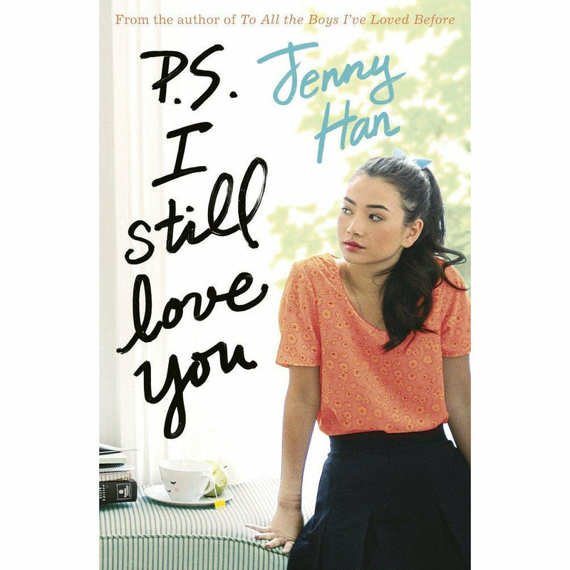 Paperback of To All the Boys I’ve Loved Before: P.S. I Still Love You by Jenny Han, a fiction book with a colorful cover.