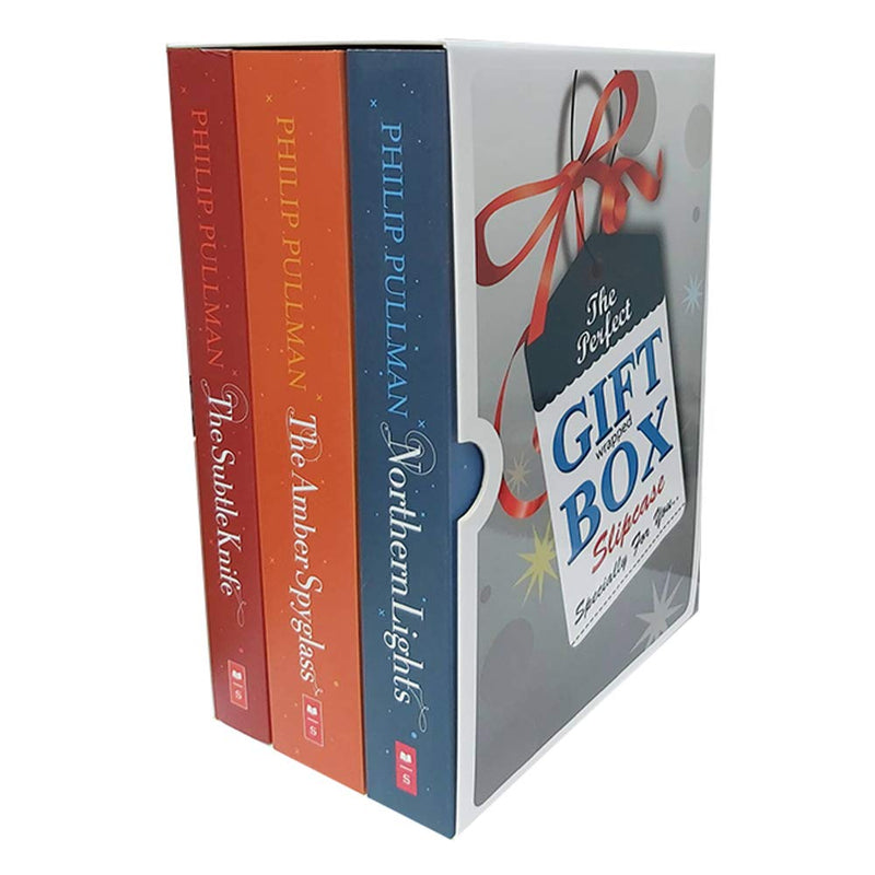 Three paperback books from Philip Pullman's His Dark Materials collection, featuring colorful cover art and the Scholastic brand.