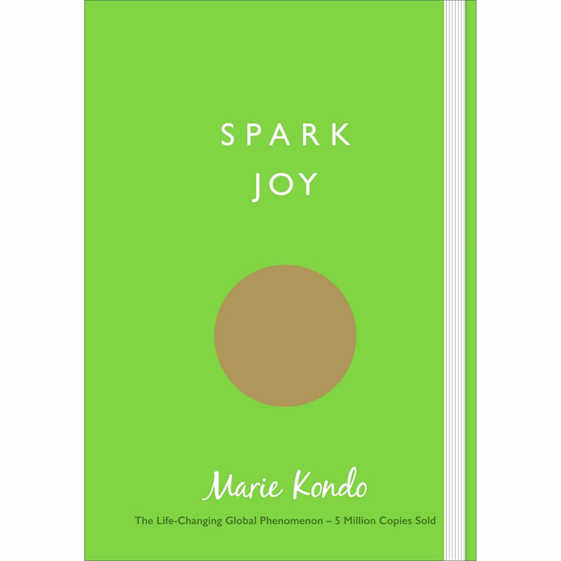 Set of three paperback books by Marie Kondo and Scott Sonenshein, including The Life-Changing Magic of Tidying, Spark Joy, and Joy at Work.