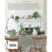 Hardcover book "At Home With Plants" by Ian Drummond and Kara O'Reilly, featuring stylish indoor plant decor tips and inspiration.
