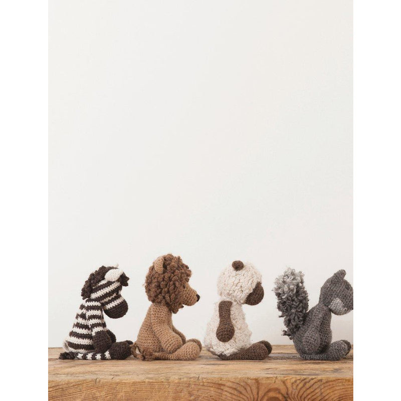 Close-up of colorful crochet animal toys from Edward's Menagerie book by Kerry Lord, showcasing soft, snuggly plush creatures.