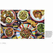 Hardcover copy of "The Art of Eating Well" by Jasmine and Melissa Hemsley, featuring a colorful food-themed cover.