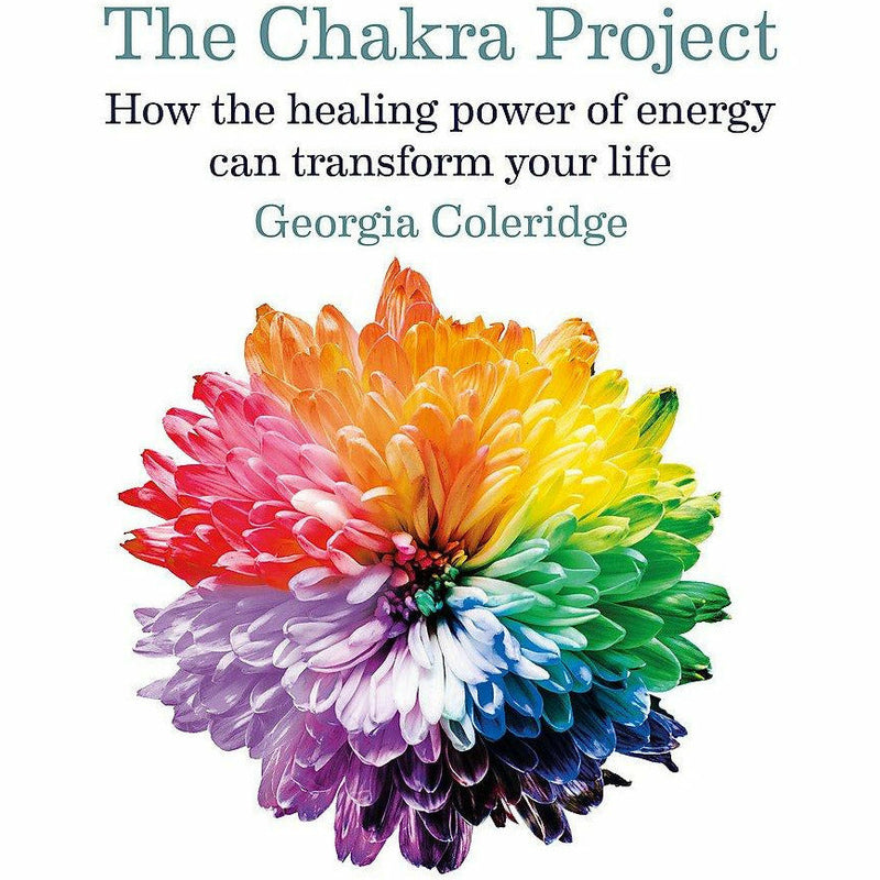 A hardcover book titled "The Chakra Project" by Aster, featuring a colorful chakra energy design on the cover.