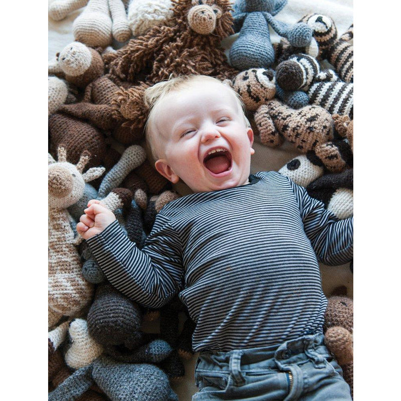 Soft crochet toy animals from Edwards Menagerie by Kerry Lord, featuring over 40 snuggly animal patterns on the paperback cover.