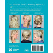 Open paperback of the New Braiding Handbook by Abby Smith, featuring braided hair styles on the cover.