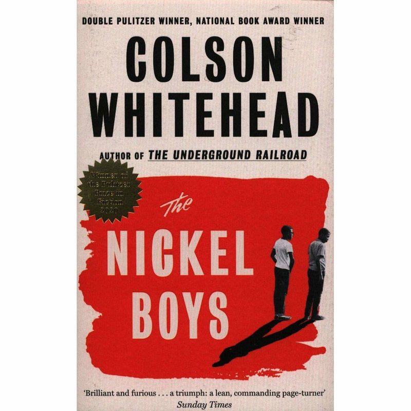 Three paperback books from Colson Whitehead's collection including The Nickel Boys, The Underground Railroad, and The Colossus of New York.