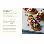 Hardback of Gino's Italian Escape book by Gino D'Acampo, featuring a colorful cover with Italian cuisine imagery.