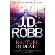 Set of five In Death novels by JD Robb, paperback fiction collection including Ceremony in Death, featuring book spines and cover art.