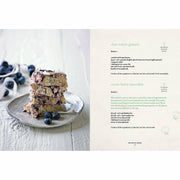 Paperback book cover for "Fast Your Way to Wellness" by Lee Holmes, featuring vibrant design and healthy food imagery.