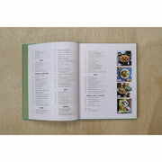 Hardback copy of The Veggie Chinese Takeaway Cookbook by Kwoklyn Wan featuring colorful vegetable dishes on the cover.