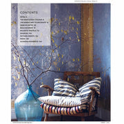 Hardcover book "Decorating With a Vibrant Modern Palette" by Antonia af Petersens, featuring colorful interior design images.