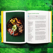 Hardcover book titled "Original Flava: Caribbean Recipes From Home" by Craig McAnuff, featuring vibrant cover art on a white background.