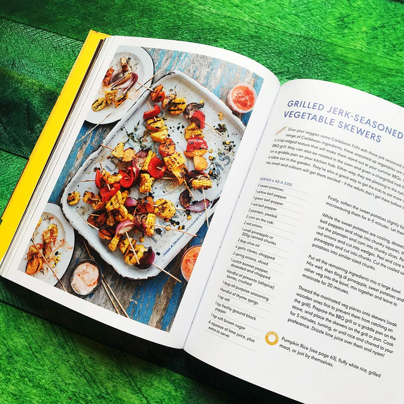 Hardcover book titled "Original Flava: Caribbean Recipes From Home" by Craig McAnuff, featuring colorful cover art with Caribbean culinary themes.
