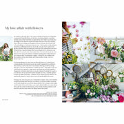 Clare Nolan's hardcover book "In Bloom" showing colorful flower illustrations on the cover, about growing and arranging flowers year-round.