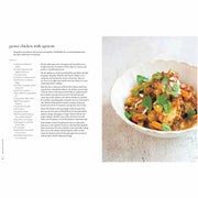 Hardcover copy of "A Bird In The Hand" by Diana Henry, featuring chicken recipes for everyday meals, published by Mitchell Beazley.