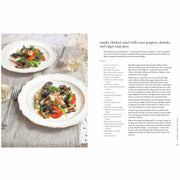 Hardcover book titled "A Bird In The Hand" by Diana Henry featuring chicken recipes for everyday meals, published by Mitchell Beazley.