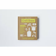 Hardcover copy of "Craft Brew: 50 Homebrew Recipes From the World's Best Craft Breweries" by Euan Ferguson, featuring a colorful cover.