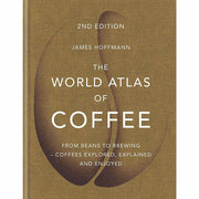 Hardcover copy of "The World Atlas of Coffee" by James Hoffmann, featuring coffee beans and brewing methods on the cover.