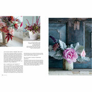 Hardcover book titled "In Bloom" by Clare Nolan, featuring vibrant floral illustrations on the cover.