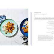 Hardcover of Rosa's Thai Cafe: The Vegetarian Cookbook by Saiphin Moore with colorful Thai dish photos on the cover.