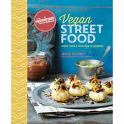 Set of three hardcover vegan street food and Thai cookbook by Sabrina Ghayour, featuring colorful dish images and recipe pages.