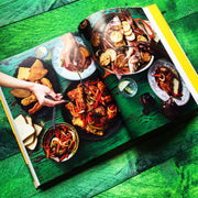 Hardcover of Original Flava: Caribbean Recipes From Home by Craig McAnuff, featuring colorful Caribbean dish photos.