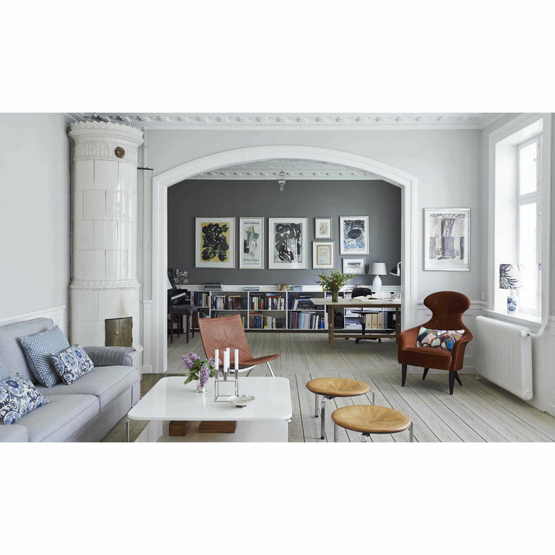 Hardcover book cover of "The Scandinavian Home" by Niki Brantmark, featuring light-inspired interior design images and Scandinavian style.