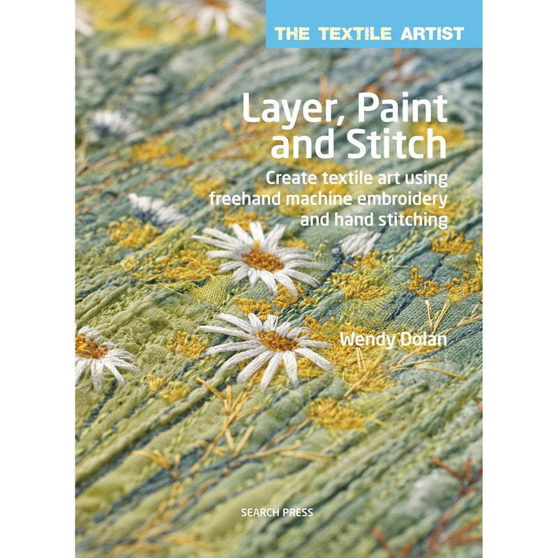 Paperback book titled "Layer, Paint and Stitch" by Wendy Dolan, featuring textile art and freehand machine embroidery techniques.