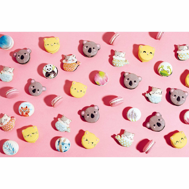 Cover of "Baking With Kim-Joy" hardcover cookbook featuring colorful, whimsical baked goods and playful illustrations.