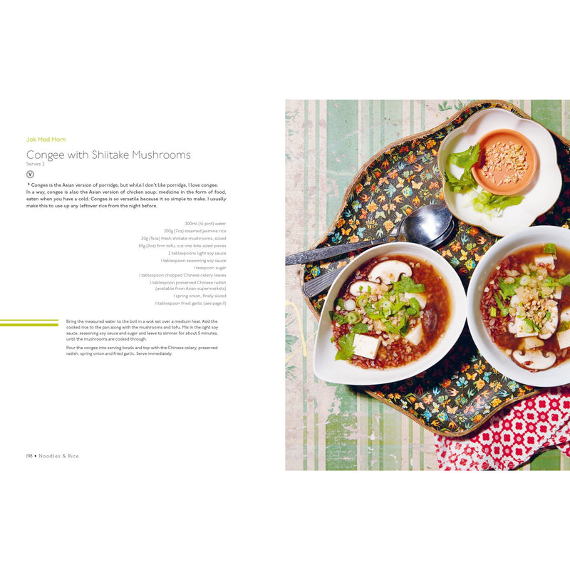 Hardcover of Rosa's Thai Cafe Vegetarian Cookbook by Saiphin Moore featuring colorful Thai dishes on the cover.