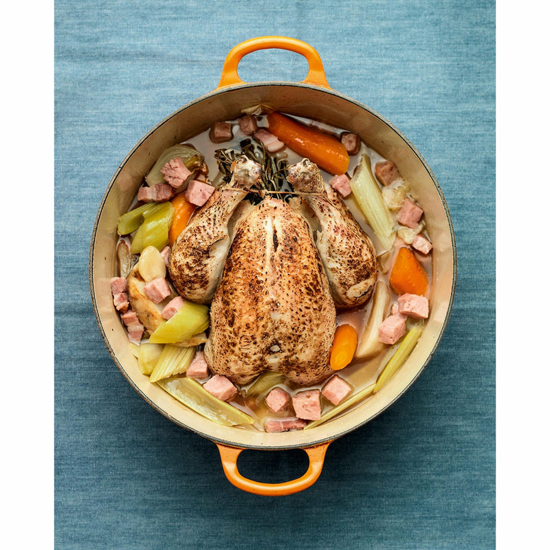 Hardcover copy of "Tom's Table: My Favourite Everyday Recipes" by Tom Kerridge, featuring a close-up of the book cover.