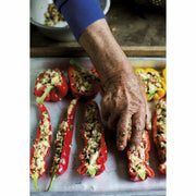 Hardcover book titled "Vegetables" by Antonio Carluccio, featuring colorful vegetable illustrations on the cover.