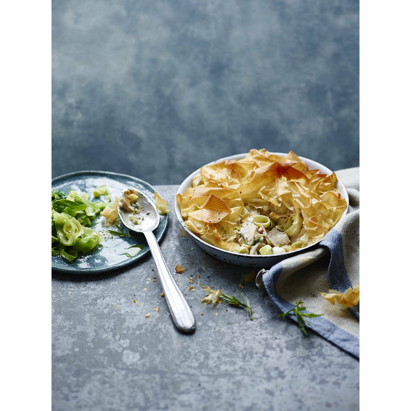 Paperback copy of "The Fat-Loss Plan" by Joe Wicks featuring 100 quick recipes and workouts, with a blue cover.
