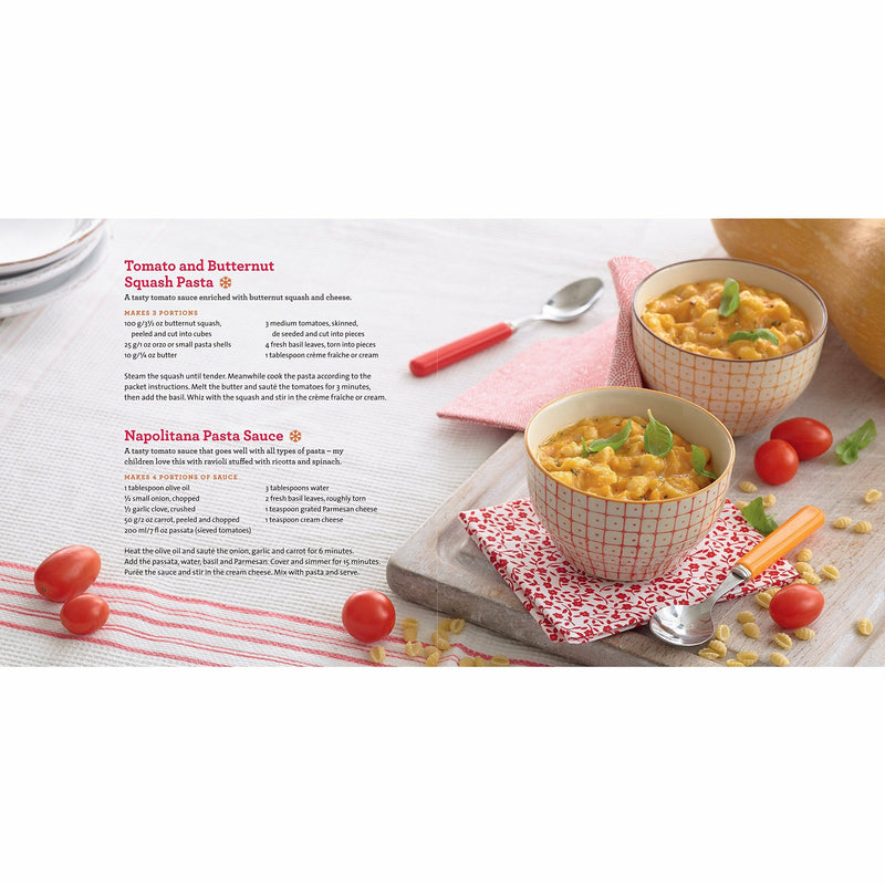 Annabel Karmel's Complete Baby & Toddler Meal Planner hardcover book with colorful pages and meal ideas for infants and toddlers.