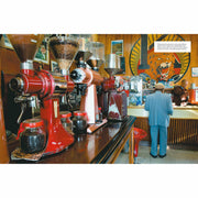 Hardcover copy of "The World Atlas of Coffee" by James Hoffmann, featuring coffee beans and brewing methods on the cover.
