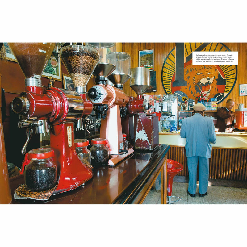Hardcover copy of "The World Atlas of Coffee" by James Hoffmann, featuring coffee beans and brewing methods on the cover.