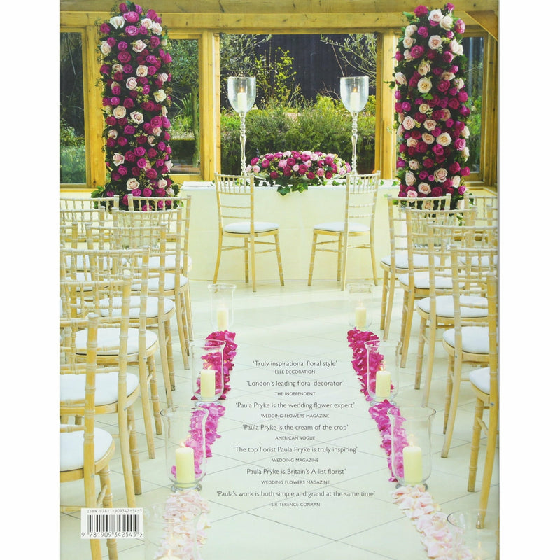 Hardcover book cover of "Paula Pryke Wedding Flowers," showcasing elegant floral arrangements and the author's name.