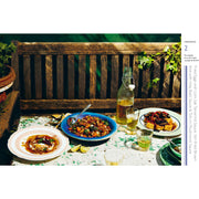 Hardcover of Rosa's Thai Cafe Vegetarian Cookbook by Saiphin Moore, featuring vibrant Thai dish photos on the cover.