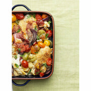 Hardcover of Tom's Table: My Favourite Everyday Recipes by Tom Kerridge, featuring a colorful cover with recipe images.