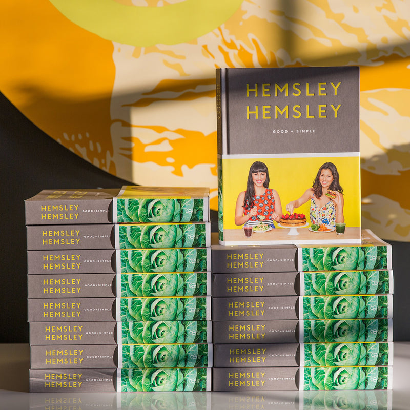 Hardcover book "Good + Simple" by Jasmine and Melissa Hemsley on healthy home cooking for gut health, with a clean, minimal cover design.